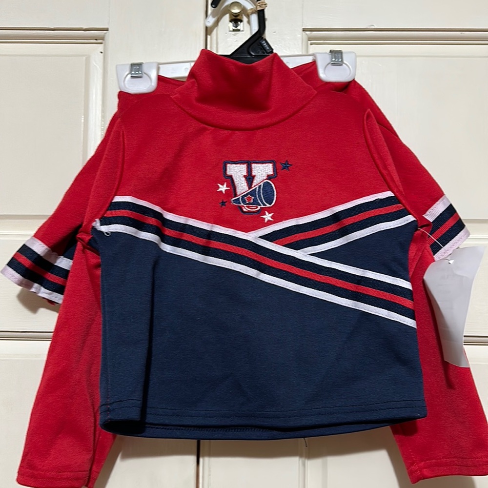 Size 5 Varsity cheer uniform with built in shorts shows signs of wear